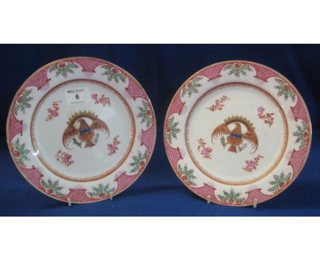 Pair of 19th Century Continental porcelain cabinet plates, having eagle and shield crest within floral borders, possibly Samp