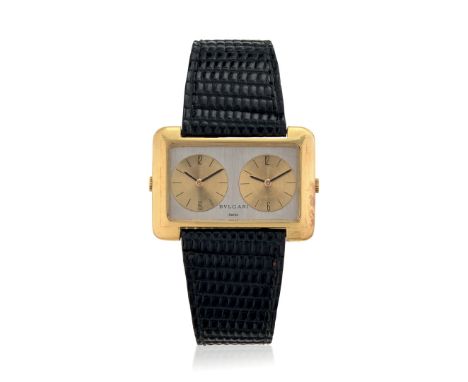 GERALD GENTA FOR BVLGARI TWO TIME ZONES IN GOLD, 2000S Case: signed Gerald Genta and Bvlgari, n. 6049 in 18K gold, caseback w