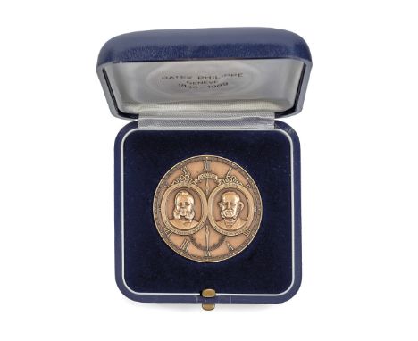 PATEK PHILIPPE 150 YEARS COMMEMORATIVE MEDAL On the reverse inscription "Henri Stern and Phillipe Stern To our friends on the