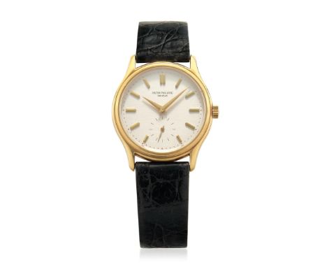 PATEK PHILIPPE CALATRAVA REF. 3923 IN GOLD, BOX AND GUARANTEE, SOLD IN 1991 Case: signed, n. 2800500, in 18K gold, snap on ca