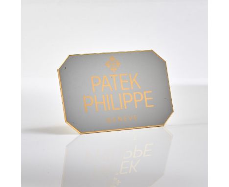 PATEK PHILIPPE PLATE In gold-plated metal and white lacquer, marked on the back CH. Huguenin. Size: 15 x 10 cm