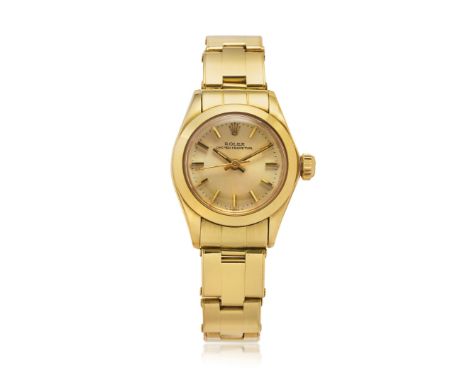 ROLEX OYSTER PERPETUAL REF. 6718 IN GOLD, BOX AND GUARANTEE, SOLD IN 1977 Case: signed, n. 5074187, in 18K gold, screwed case