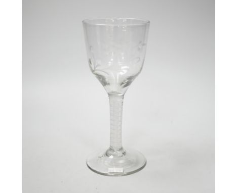 An English lead crystal DSOT goblet, c.1760, ogee bowl with tool marks and engraved with polished flora opposite a single ins