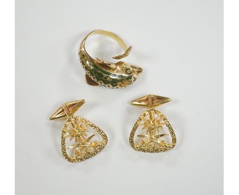 A continental 18k and two colour enamel dolphin ring, size N and a pair of 750 yellow metal Middle Eastern cufflinks, gross w