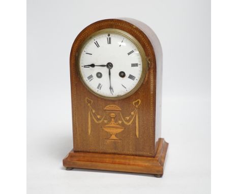An Edwardian marquetry mantel clock with enamel dial, the case inlaid with swags, 26cm high