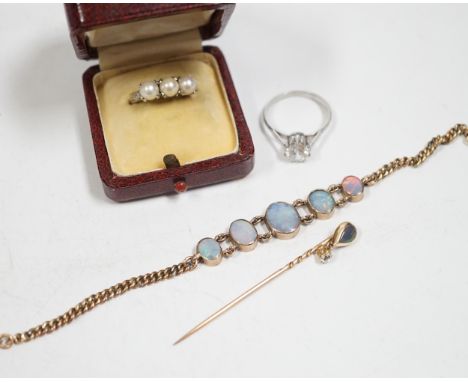 A yellow metal and graduated five stone oval white opal set bracelet, 16.5cm, a yellow metal opal and diamond drop set stick 