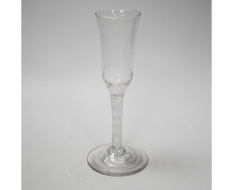 An English lead crystal ratafia glass, c.1750-60, the bowl is slightly waisted and elongated with an ogee finish and basal mo