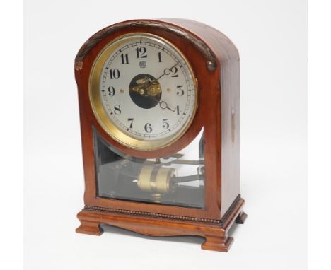 A Bulle electric mahogany mantel clock, 31cm high