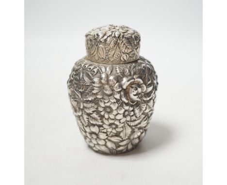 An early 20th century American Galt Bros. sterling tea caddy, embossed with flowers, 10.3cm, 4.7oz.
