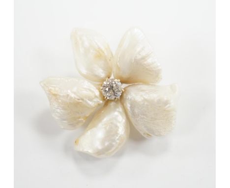 A yellow metal mounted baroque pearl and single stone diamond set flower head brooch, 30mm, gross weight 9.1 grams.