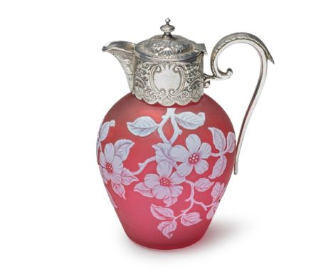 A Stourbridge cameo glass silver-mounted claret jug, dated 1891Of baluster form, the ruby ground overlaid in opaque white and