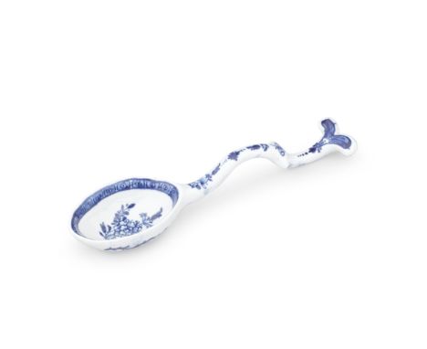 A Bow dessert ladle, circa 1765-70The oval bowl painted in blue with a peony spray below a cell border, the shaped handle wit