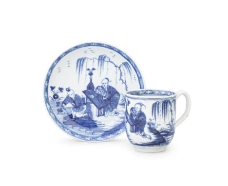 A Worcester coffee cup and saucer, circa 1765 and 1770The cup with a grooved handle, painted in blue with the 'Gardener' patt
