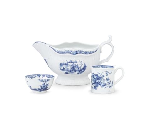 A rare Worcester teabowl, a sauceboat and a coffee can, circa 1757-60The teabowl painted in blue with the 'Diagonal Rocks' pa