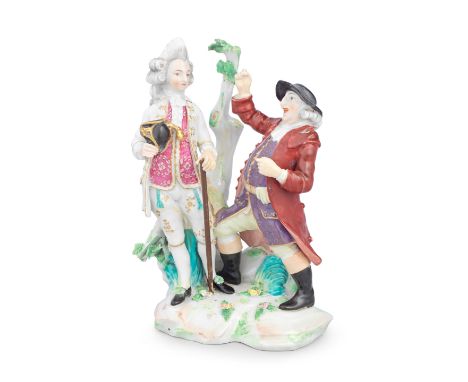 A very rare Derby Macaroni group, circa 1775-80Modelled as a young dandy wearing a ridiculous hairdo and a patterned pink wai