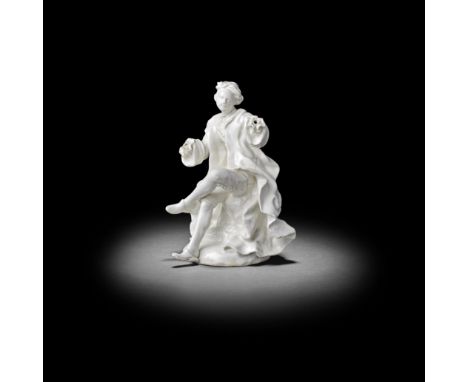 A Derby 'Dry Edge' figure of 'Sight', circa 1752-55From a set of The Five Senses, modelled seated in an animated pose, his ar