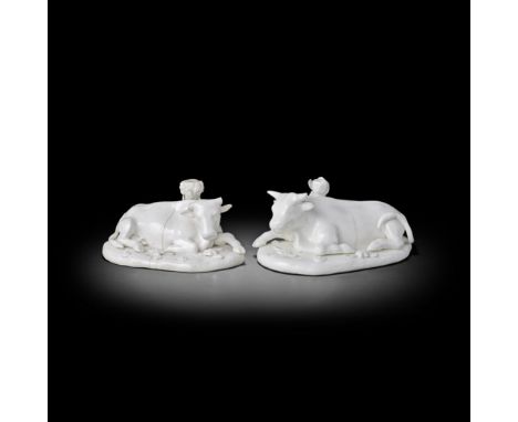 A pair of West Pans models of a cow and a bull, circa 1764-75Modelled lying on irregular bases applied with distinctive flowe