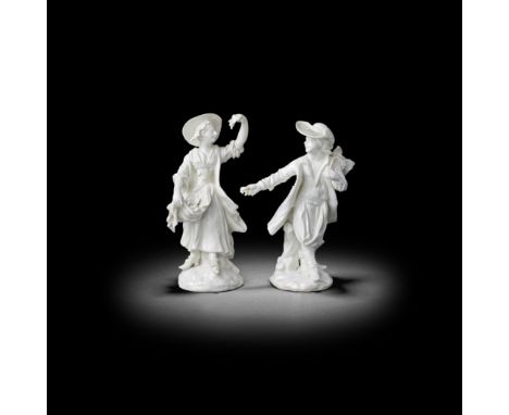 A pair of Derby 'Dry Edge' figures of 'Autumn', circa 1752-55From a set of The Four Rustic Seasons, modelled standing on moun