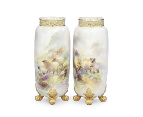 A pair of Royal Worcester vases by Harry Davis, dated 1911Of cylindrical form, raised on four gilt leaf scrolled feet, the pi