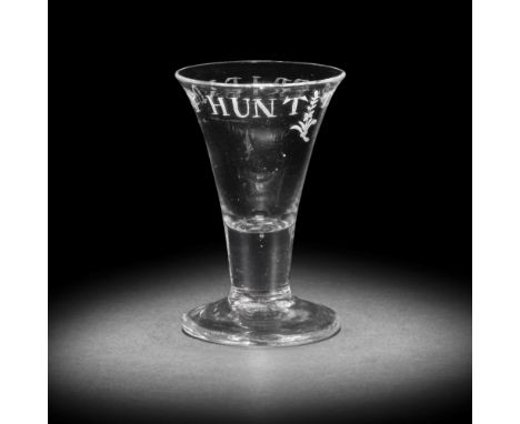 An engraved 'Friendly Hunt' firing glass of Jacobite interest, circa 1750The drawn trumpet bowl inscribed 'THE FRIENDLY HUNT'