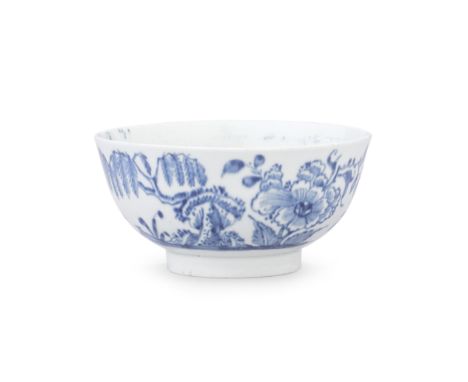 A very rare Worcester bowl, circa 1752-53Painted in blue with a series of plant and rockwork motifs including a willow tree, 