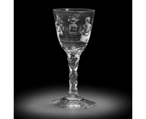 A very rare Dutch stipple-engraved facet stem wine glass by J Wolff, 1770-1780The generous round funnel bowl engraved with a 