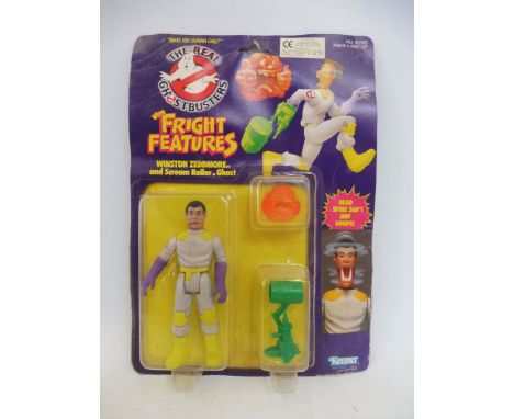 An original release carded The Real Ghostbusters Kenner Winston Zeddmore and Scream Roller Ghost, card has edge buffering and