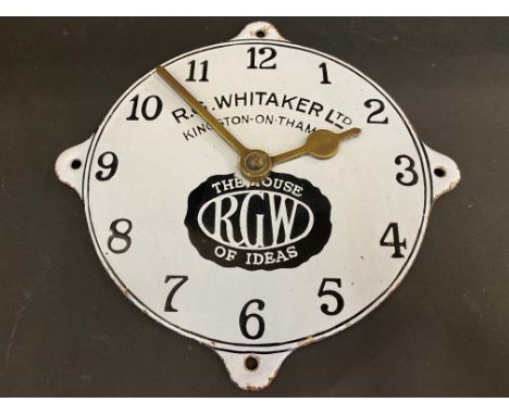An unusual enamel clock face advertising R.G. Whitaker Ltd, Kingston-on-Thames, 9 1/2" diameter. 
