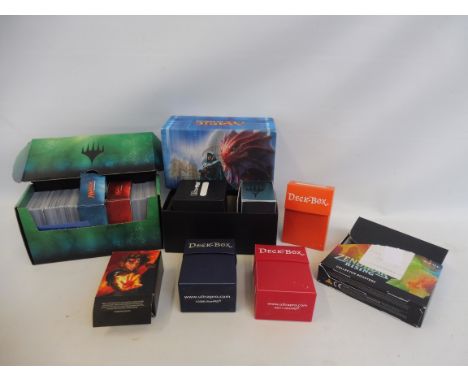 Approximately 2000 Magic The Gathering trading cards plus booster cards. 