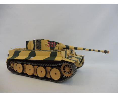 A scale model of a German Panzer tank, circa WWII, hand painted. 