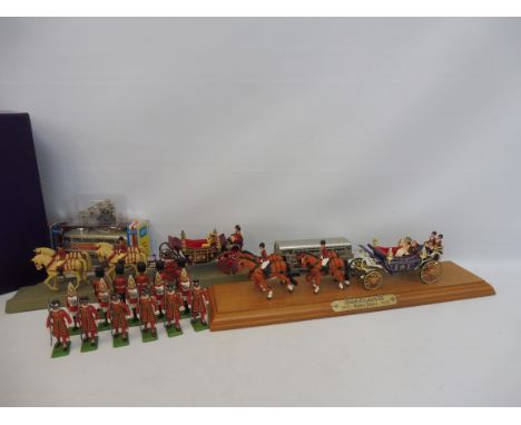 A Britains Ceremonial Landau and a state coach plus a Corgi boxed Queen Elizabeth II Golden Jubilee plus a quantity of Britia