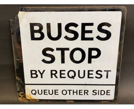A 'Buses Stop By Request' double sided enamel sign, some minor older amateur retouching mainly to the mounting corners, 13 x 