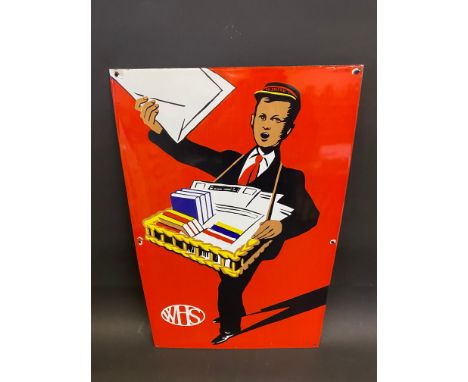 A W.H. Smith pictorial enamel sign depicting a book/newspaper seller, this sign is in superb near mint condition and almost c