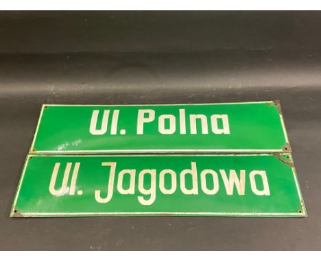 A pair Polish enamel road/street signs, one by repute has the same name on a Polish vodka 'Soplica', each sign 25 1/2 x 6 1/2