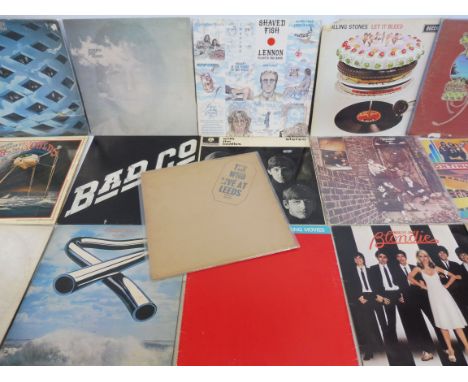 A selection of 16 collectable vinyl LPs, to include The Beatles white album, The Who, Yes, The Who Live at Leeds, including p