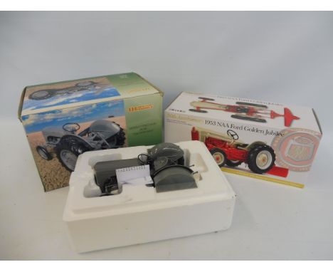 An Ertl 1/16th scale 1953 NAA Ford Golden Jubilee, near mint and boxed, with a 1/16th scale Massey Ferguson TE20, Little Grey