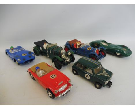 A selection of loose circa 1960s Scalextric slot cars to include a WO Bentley Blower and an Alfa Romeo.