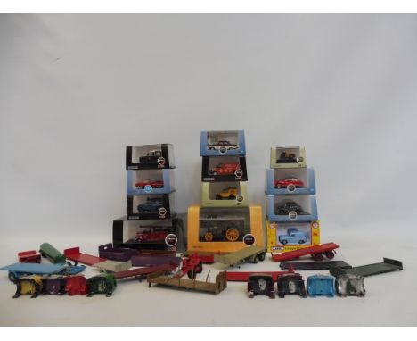 A quantity of 1:76th scale white metal lorry cabs plus various truck body parts, also 12 assorted Oxford die-cast models incl