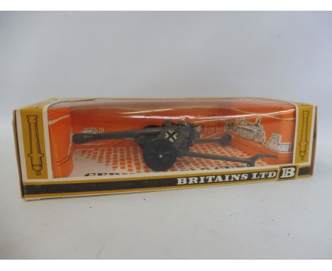 A Britains 1/32 scale German field gun model in box, in excellent condition.