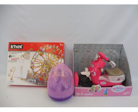 A Kinecy building set including Flying Fairy and kid's scooter.