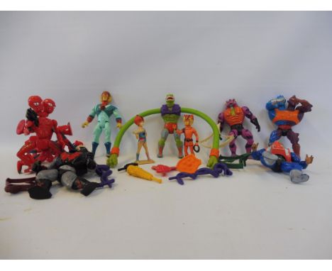 A box of predominantly Thundercats action figures including Tygra, many weapons plus some He-man figures too, generally good 