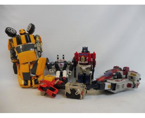 A box of large scale Transformers including Bumblebee. 