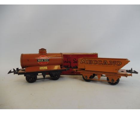 A boxed Hornby O guage Rotary Tipping Wagon in Meccano livery plus an unboxed Pratts High Test tanker. 