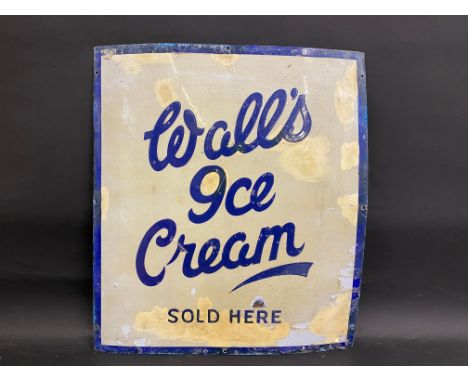 A Walls Ice Cream Sold Here rectangular enamel sign, with older amateur retouching and peeling varnish, 21 x 23 3/4".