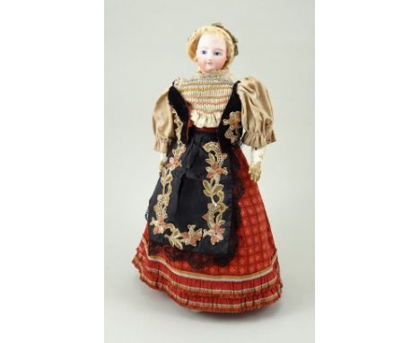 A bisque shoulder head Fashion doll, 1870s, with painted blue eyes, lashes and brows, closed slightly smiling mouth, pierced 