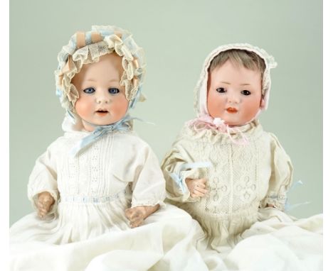 A.M 233 bisque head baby doll, German circa 1910, with weighted blue glass eyes, painted lashes and brows, open mouth, two up