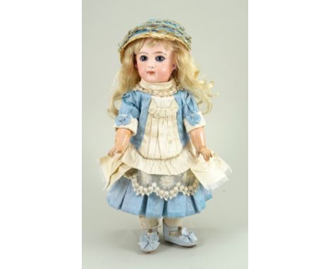 Emile Jumeau bisque head Bebe doll, size 4, French circa 1885, with fixed blue glass paper-weight eyes, finely painted lashes