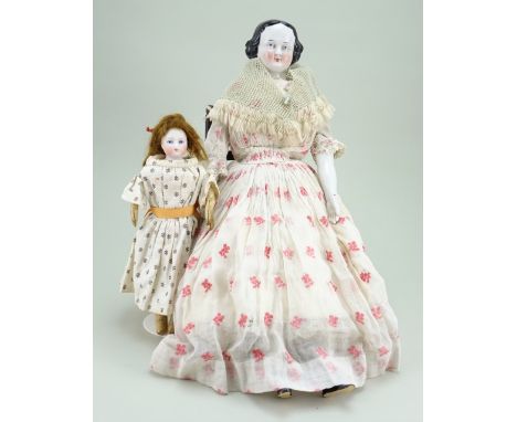 Early glazed china shoulder-head doll, German circa 1850, with finely painted blue eyes, red line to lids and single stroke e