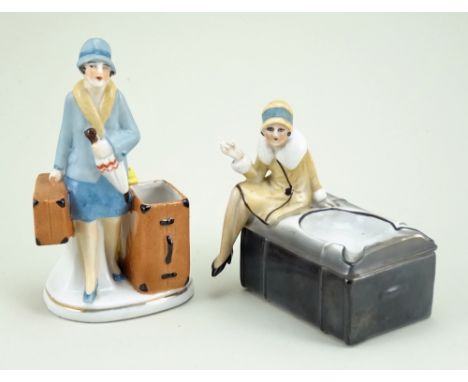 Glazed china Flapper vesta holder and cigarette holder/ashtray figurines, 1920s, lady figure walking holding a suitcase and u