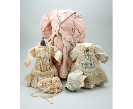 A good Ivory silk dress and bonnet for French Bebe doll, with ruched centre panel and pleated skirt, lace detail to collar, s